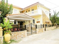 Land with Studio and Apartment Building For Sale